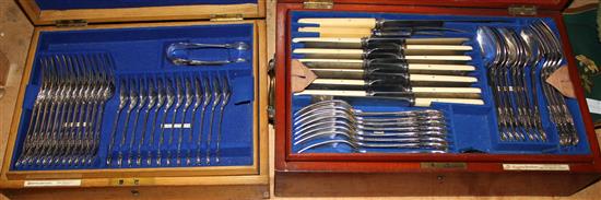 12 silver teaspoons and pair sugar tongs in 2 canteens with matched plated cutlery